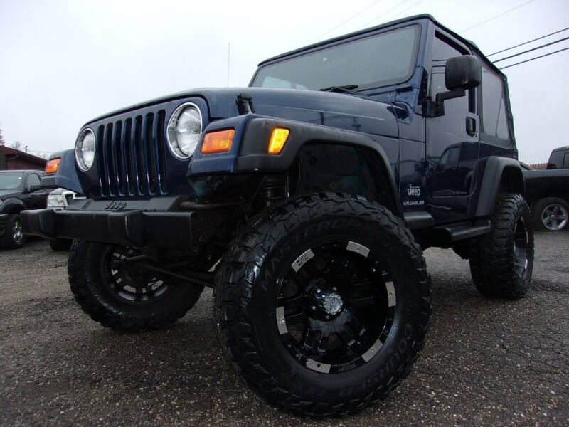 2003 Jeep Wrangler for sale at JEFF MILLENNIUM USED CARS in Canton OH