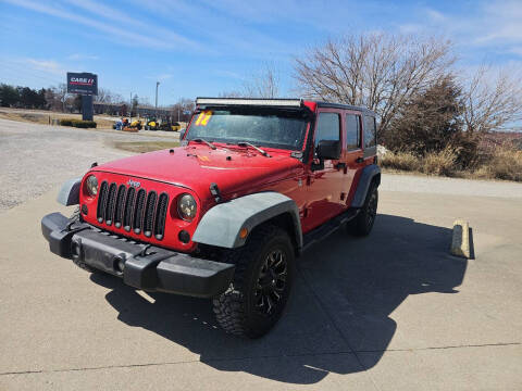 2012 Jeep Wrangler Unlimited for sale at Sam's Auto Sales in Mount Pleasant IA