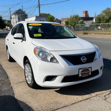 2012 Nissan Versa for sale at A & J AUTO GROUP in New Bedford MA