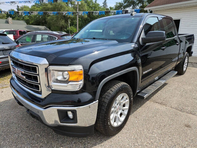 2015 GMC Sierra 1500 for sale at DANGO AUTO SALES in HOWARD CITY, MI