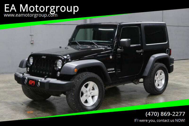 2014 Jeep Wrangler for sale at EA Motorgroup in Austin TX