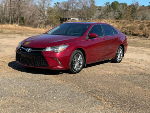 2015 Toyota Camry for sale at WHOLESALE AUTO GROUP in Mobile AL