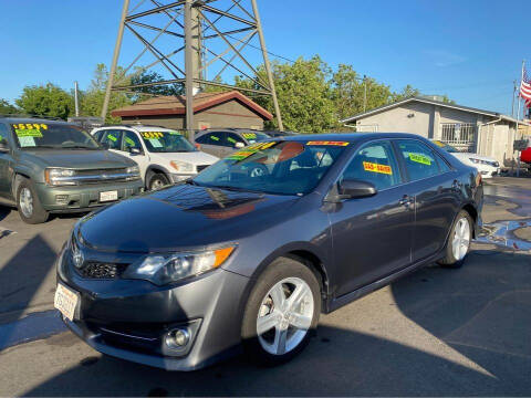 2014 Toyota Camry for sale at WESLEYS AUTO WORLD LLC in Oakdale CA