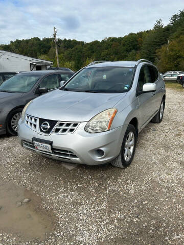 2011 Nissan Rogue for sale at LEE'S USED CARS INC in Ashland KY