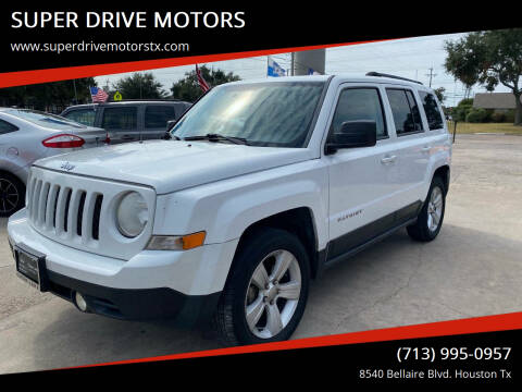 2013 Jeep Patriot for sale at SUPER DRIVE MOTORS in Houston TX