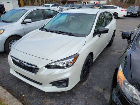 2018 Subaru Impreza for sale at JERRY GRADL MOTORS INC in North Tonawanda NY