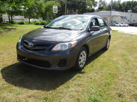 2011 Toyota Corolla for sale at Triangle Auto Sales in Elgin IL