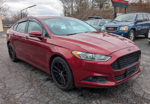 2015 Ford Fusion for sale at TEMPLE AUTO SALES in Zanesville OH
