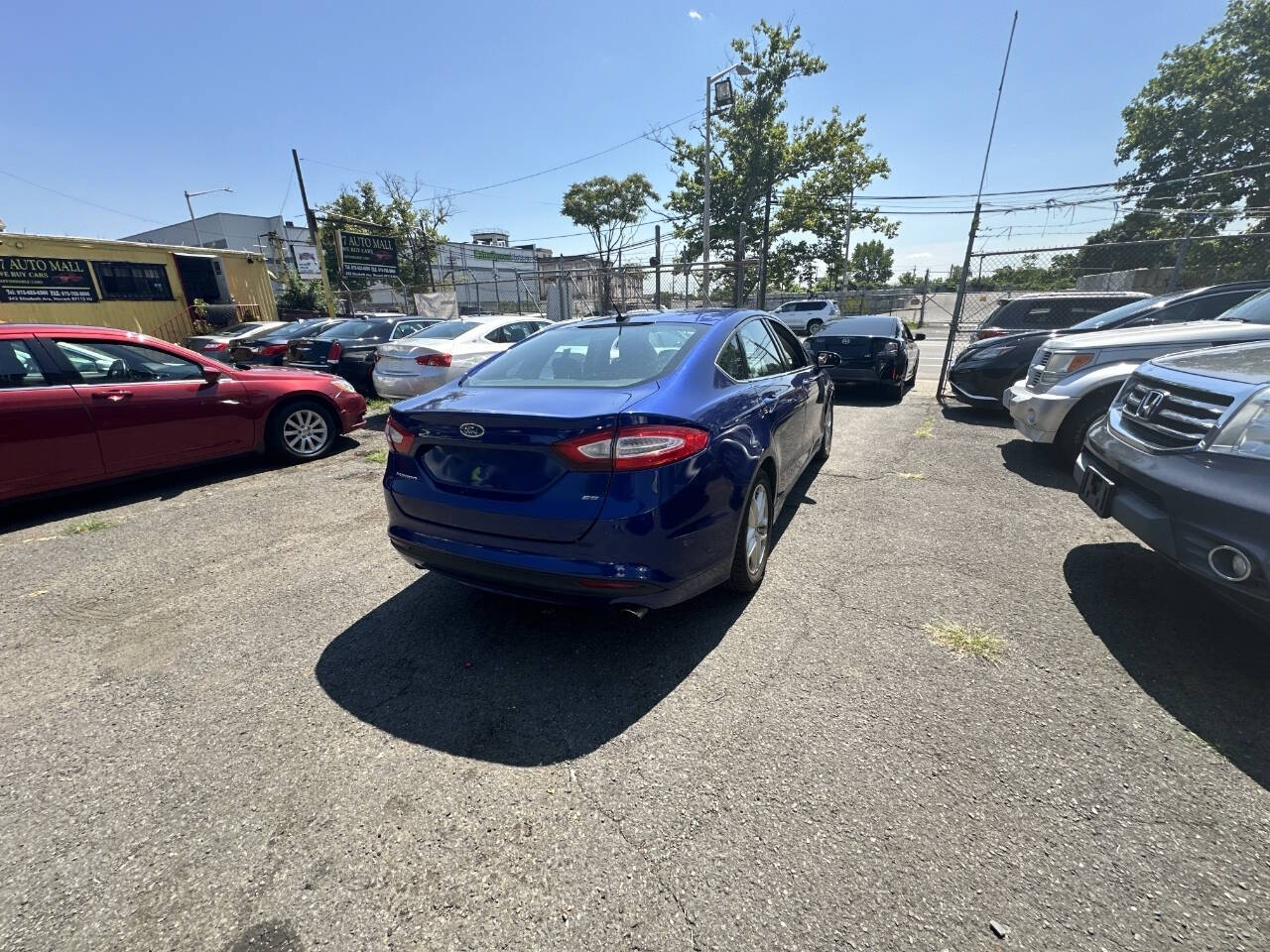 2014 Ford Fusion for sale at 77 Auto Mall in Newark, NJ