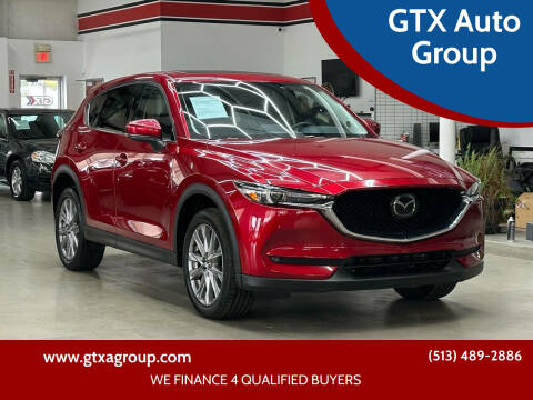 2021 Mazda CX-5 for sale at GTX Auto Group in West Chester OH