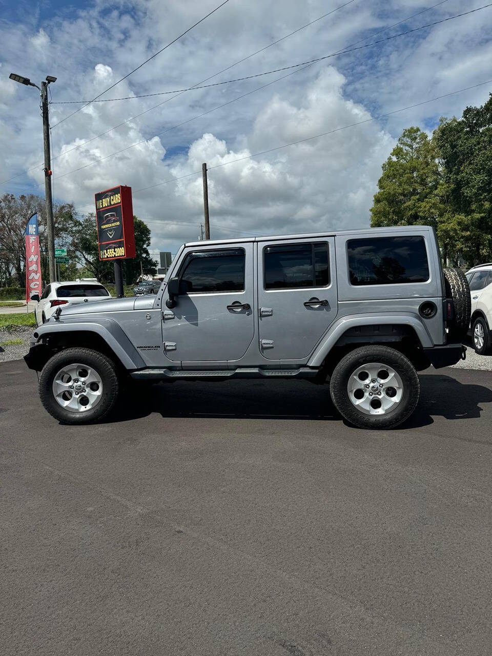 2014 Jeep Wrangler Unlimited for sale at PLANTATION MOTORS in Tampa, FL