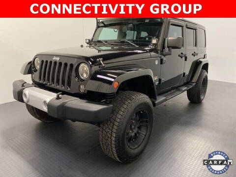 2014 Jeep Wrangler Unlimited for sale at CERTIFIED AUTOPLEX INC in Dallas TX