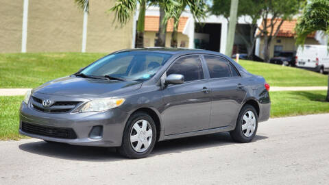2013 Toyota Corolla for sale at Maxicars Auto Sales in West Park FL
