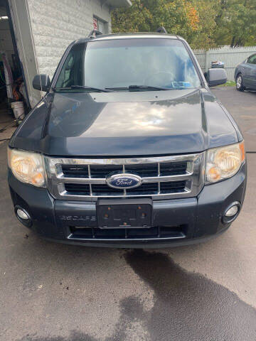 2009 Ford Escape for sale at Right Choice Automotive in Rochester NY