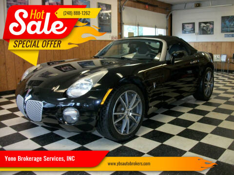2006 Pontiac Solstice for sale at Farmington's Finest Used Autos - Yono Brokerage Services, INC in Farmington MI