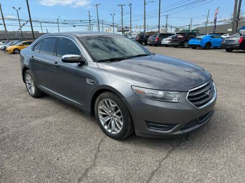 2014 Ford Taurus for sale at M-97 Auto Dealer in Roseville MI