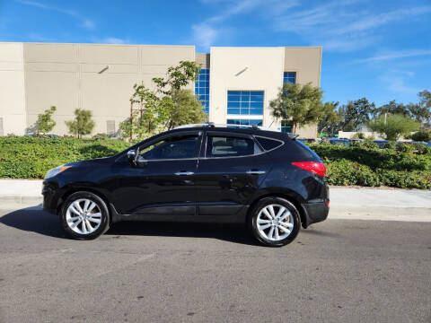 2012 Hyundai Tucson for sale at E and M Auto Sales in Bloomington CA