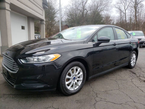 2015 Ford Fusion for sale at STRUTHERS AUTO MALL in Austintown OH