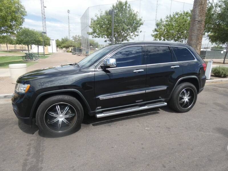 2011 Jeep Grand Cherokee for sale at J & E Auto Sales in Phoenix AZ