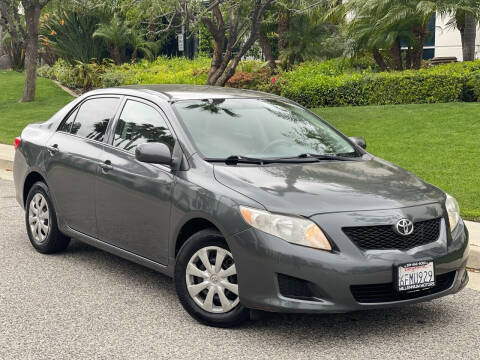 2009 Toyota Corolla for sale at MILLENNIUM MOTORS in Van Nuys CA