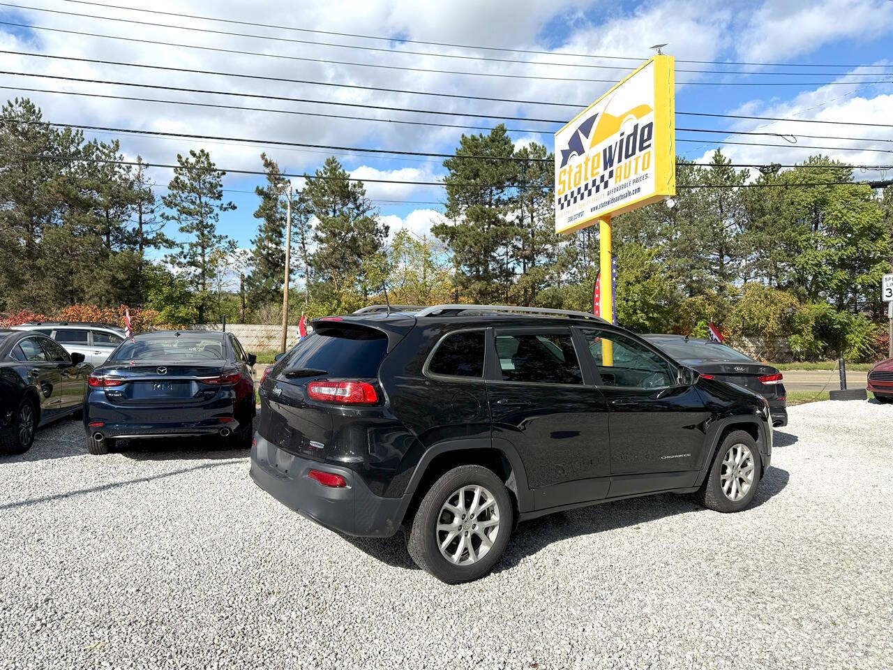 2016 Jeep Cherokee for sale at Statewide Auto LLC in Akron, OH