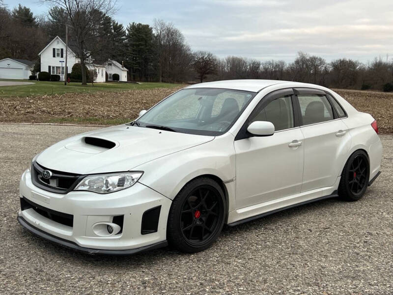 2012 Subaru Impreza for sale at The Car Mart in Milford IN