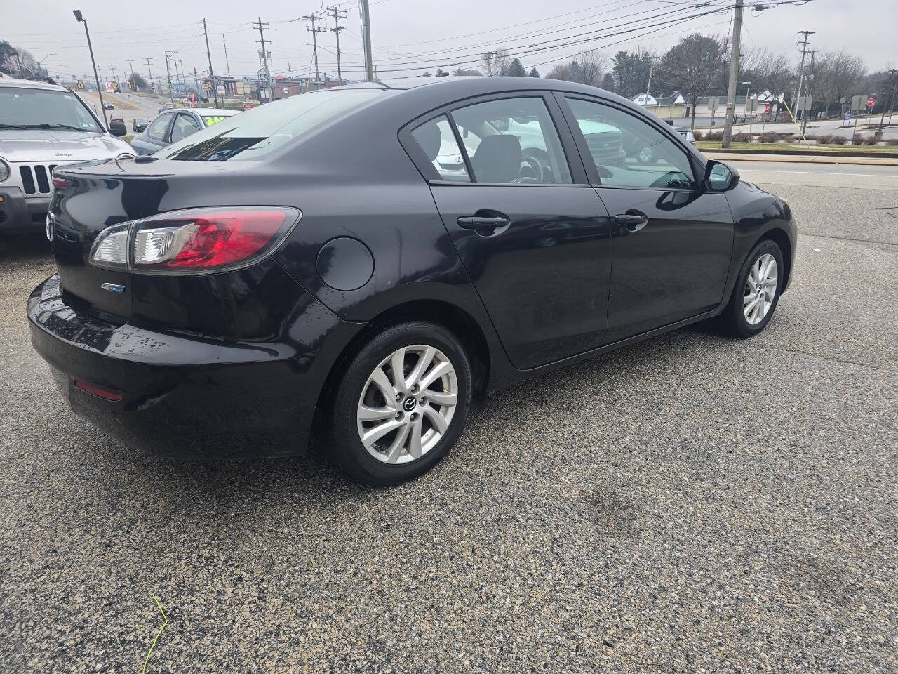 2013 Mazda Mazda3 for sale at QUEENSGATE AUTO SALES in York, PA