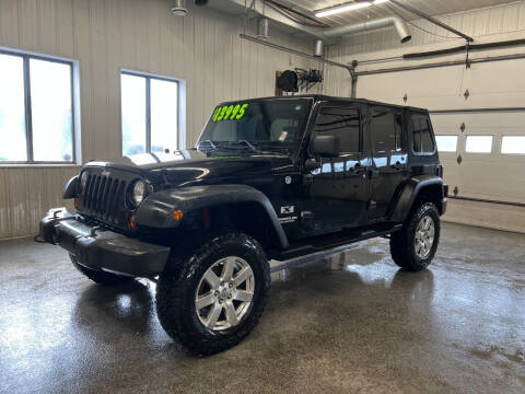 2009 Jeep Wrangler Unlimited for sale at Sand's Auto Sales in Cambridge MN