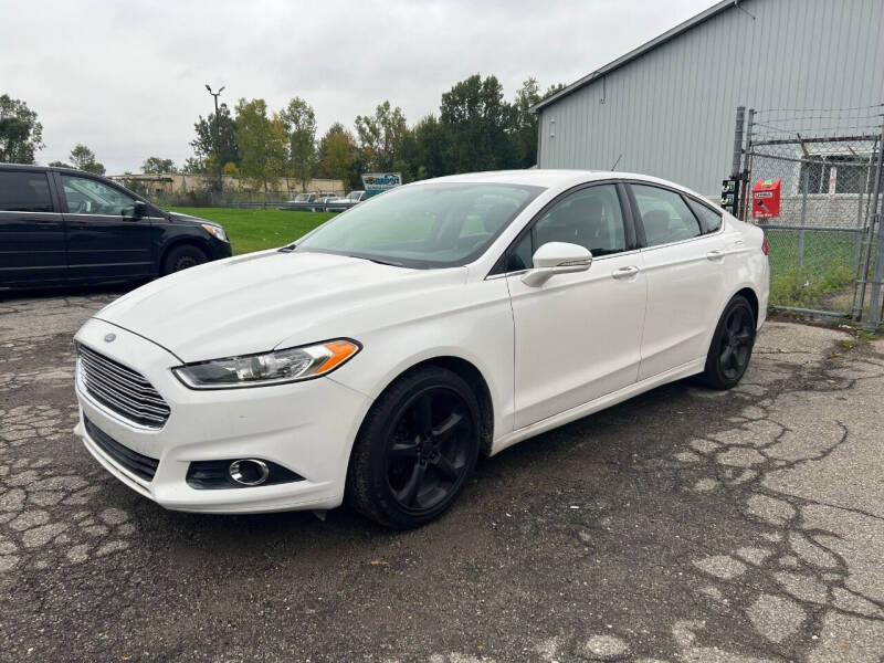 2014 Ford Fusion for sale at JEREMYS AUTOMOTIVE in Casco MI