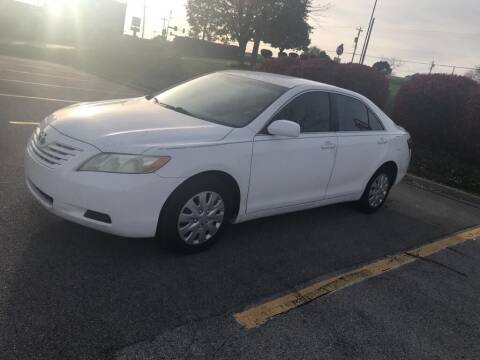 2009 Toyota Camry for sale at Auto Nova in Saint Louis MO