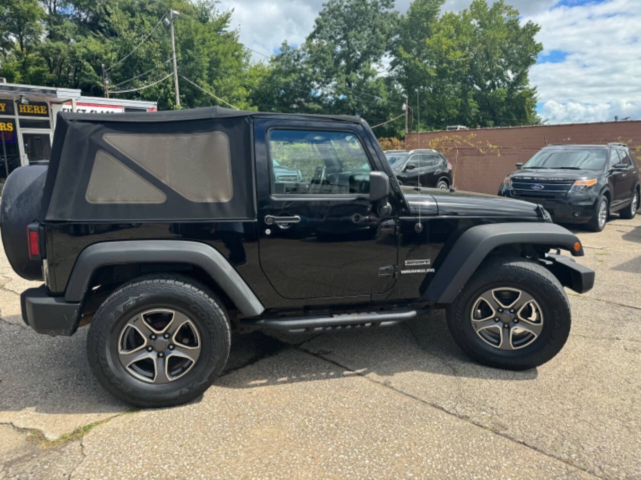 2011 Jeep Wrangler for sale at First Class Auto Mall in Akron, OH