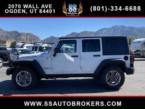 2011 Jeep Wrangler Unlimited for sale at S S Auto Brokers in Ogden UT