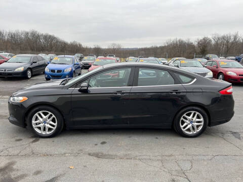 2013 Ford Fusion for sale at CARS PLUS CREDIT in Independence MO