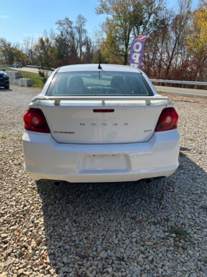 2014 Dodge Avenger for sale at STRODES AUTO GROUP LLP in Malta, OH