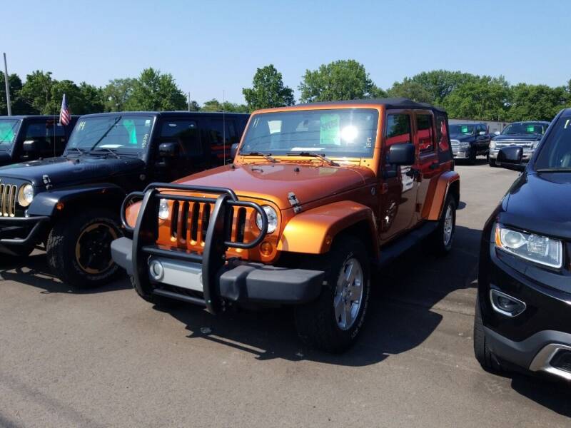 2011 Jeep Wrangler Unlimited for sale at M & H Auto & Truck Sales Inc. in Marion IN