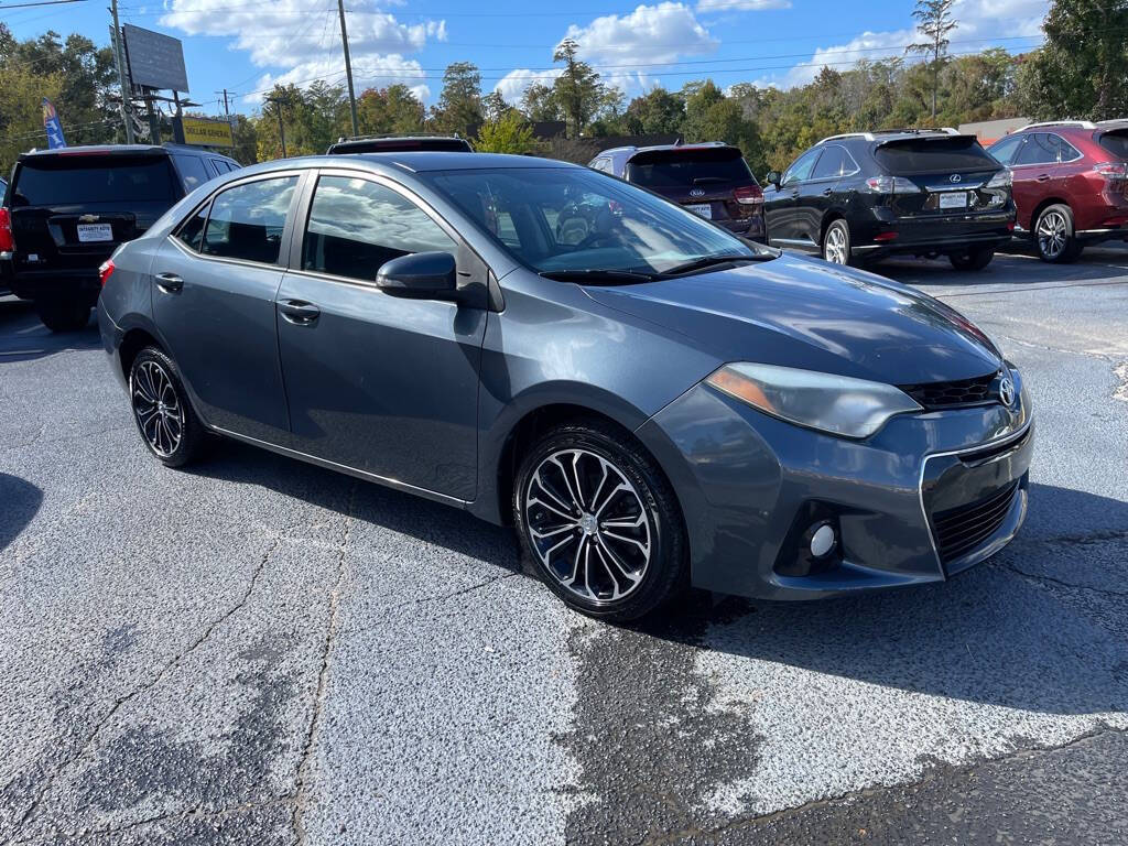 2014 Toyota Corolla for sale at INTEGRITY AUTO in Dothan, AL