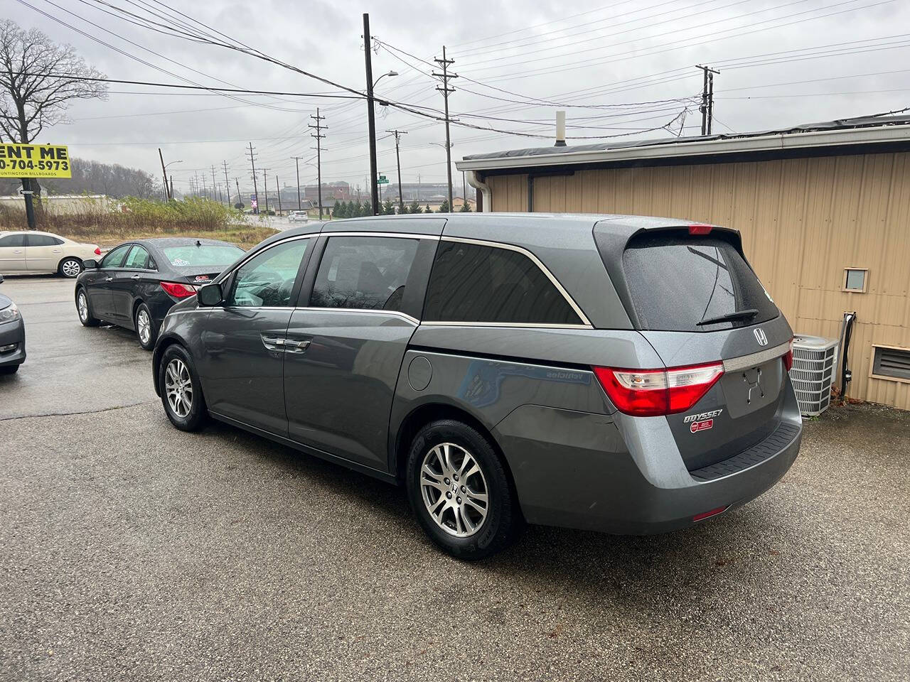 2013 Honda Odyssey for sale at BNM AUTO GROUP in GIRARD, OH