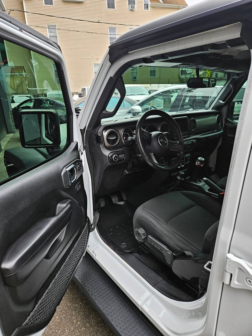 2019 Jeep Wrangler Unlimited for sale at RENOS AUTO SALES LLC in Waterbury, CT