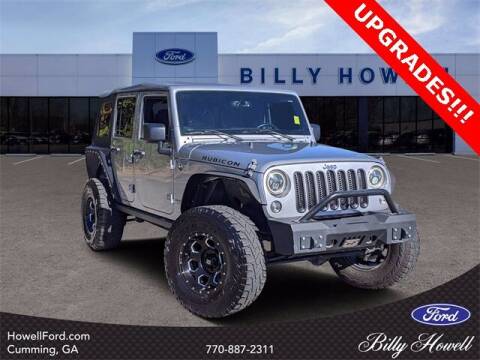 2015 Jeep Wrangler Unlimited for sale at BILLY HOWELL FORD LINCOLN in Cumming GA