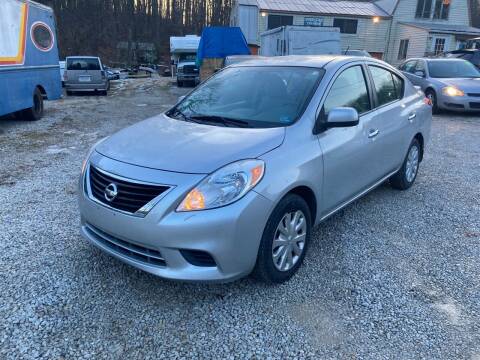 2013 Nissan Versa for sale at Used Cars Station LLC in Manchester MD