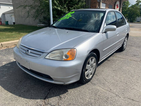 2002 Honda Civic for sale at REVOLUTION MOTORS LLC in Waukegan IL