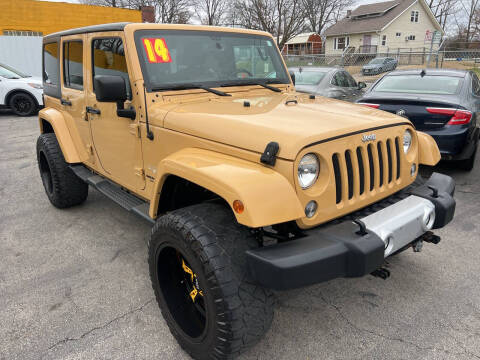 2014 Jeep Wrangler Unlimited for sale at Watson's Auto Wholesale in Kansas City MO