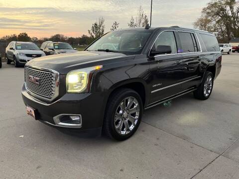 2016 GMC Yukon XL for sale at Azteca Auto Sales LLC in Des Moines IA