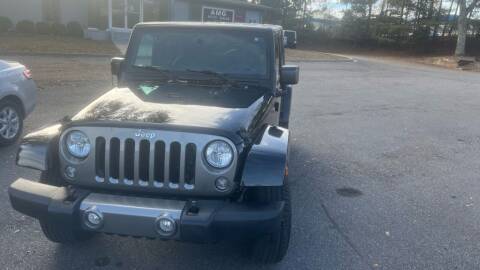 2015 Jeep Wrangler Unlimited for sale at AMG Automotive Group in Cumming GA