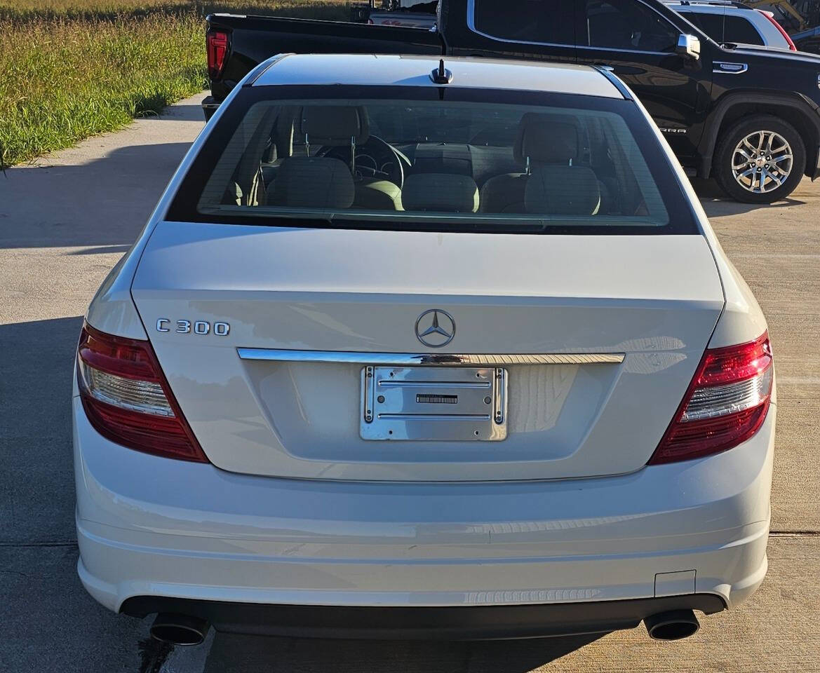 2010 Mercedes-Benz C-Class for sale at CAR MARKET AUTO GROUP in Sugar Land, TX