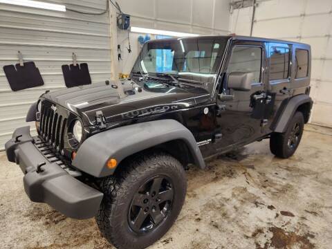 2009 Jeep Wrangler Unlimited for sale at Jem Auto Sales in Anoka MN