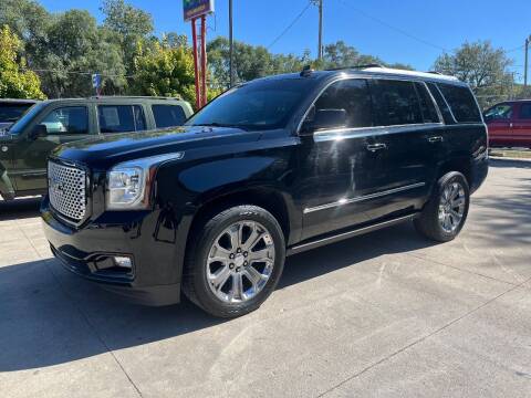 2015 GMC Yukon for sale at Azteca Auto Sales LLC in Des Moines IA