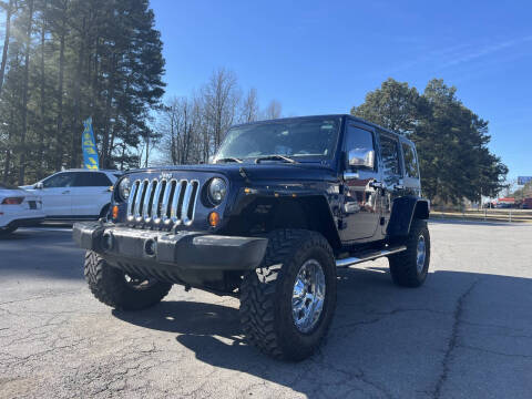2013 Jeep Wrangler Unlimited for sale at Airbase Auto Sales in Cabot AR