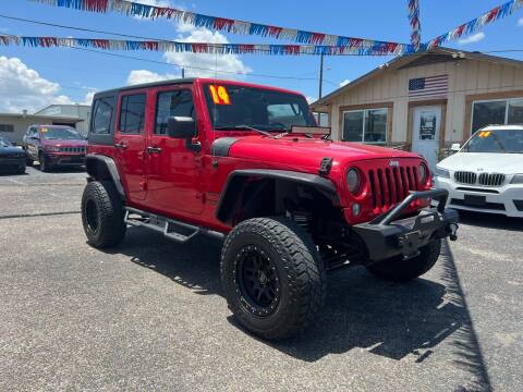 2014 Jeep Wrangler Unlimited for sale at The Trading Post in San Marcos TX