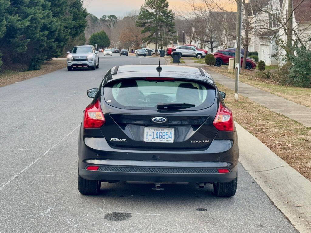 Black 2013 Ford Focus Titanium Titanium 4dr Hatchback 14